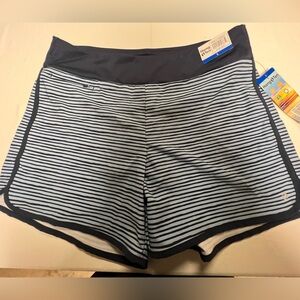 HANG TEN MENS SWIM TRUNKS. SIZE LARGE. 
LIGHT AND DARK BLUE STRIPES.